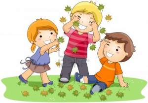 7334707-ninos-jugando-con-hojas-en-el-parque