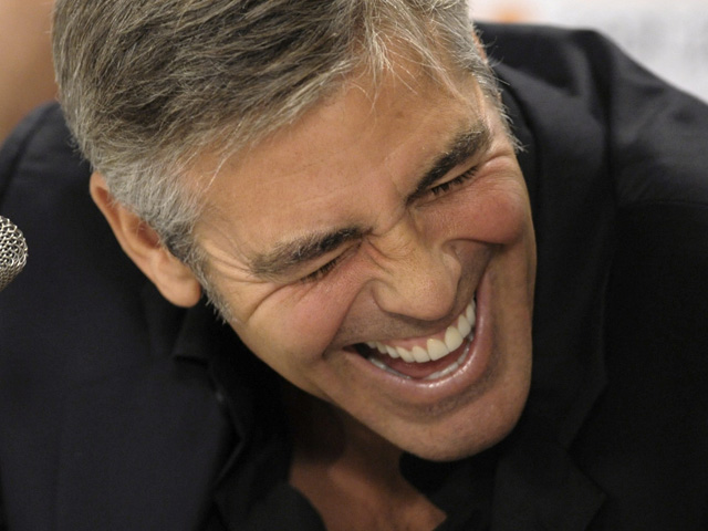 epa02717037 (FILE) A file picture dated 11 September 2009 shows US actor George Clooney laughing during a press conference for his movie 'The Men Who Stare At Goats' at the 34th annual Toronto International Film Festival, in Toronto, Canada. Clooney turns 50 on 06 May 2011. EPA/WARREN TODA *** Local Caption *** 00000401857581