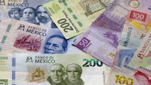 Several Mexican Banknotes of different currencies. Concept: Inflation volatility