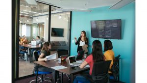 Modern millennial women in Latin start-up developing fresh ideas for crowdfunding