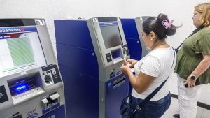 Merida, Mexico, Citibanamex bank customers, using ATM