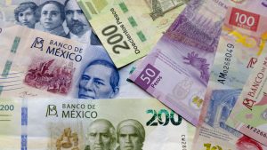 Several Mexican Banknotes of different currencies. Concept: Inflation volatility