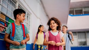 Child students talking at school