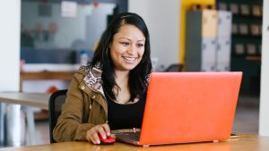 latin business woman working with computer at the office in Mexico city
