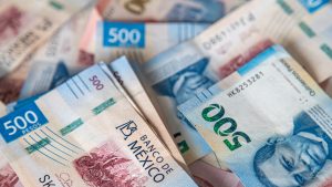 Close-up macro detail of 500 Mexican peso banknotes
