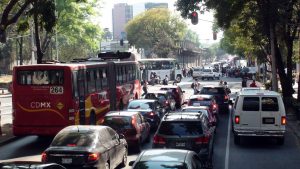Mexico City Rush Hour Road Traffic Jam, Office Building Exterior And Tree Scenery. Mexico