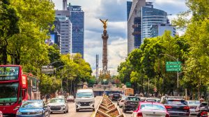 Monument to the Angel of Independence near to bbva building in Mexico City
